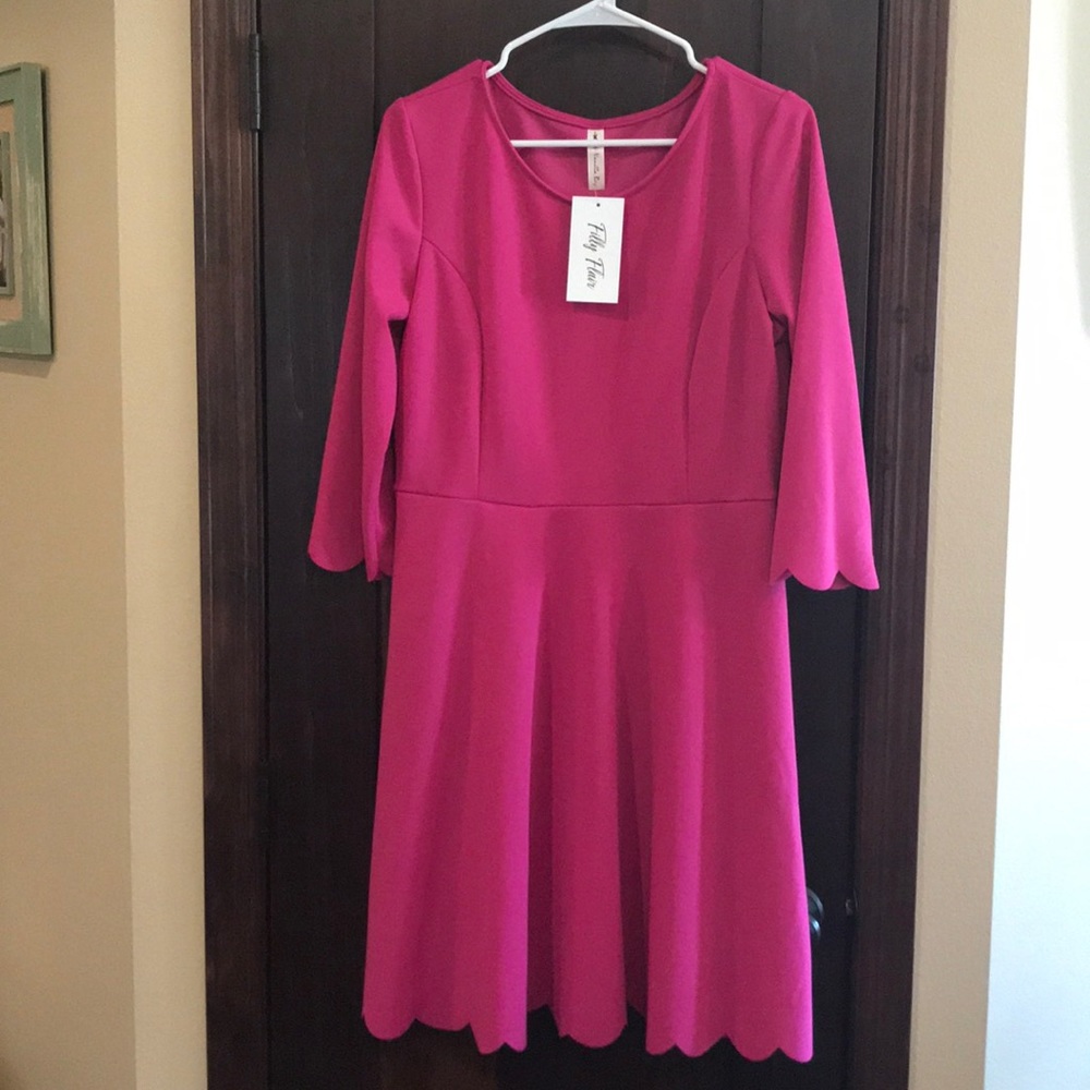 Brand New Pink Dress with Scalloped ham detail.
